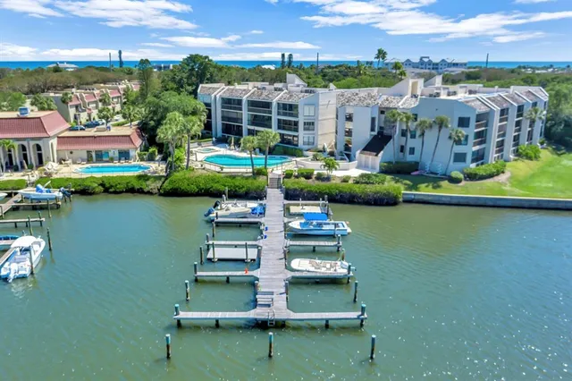 a aerial view of a house with a lake view