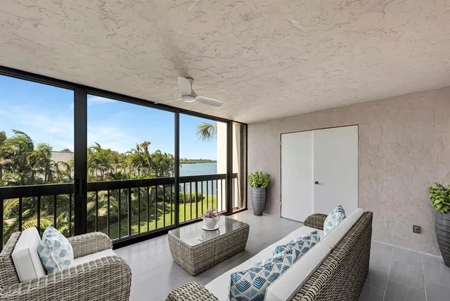 a view of a kitchen with a sink and cabinets