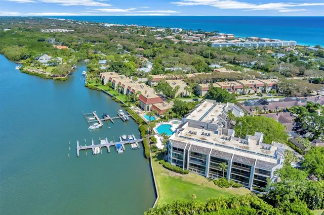 an aerial view of a house with a garden