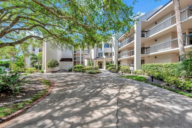 a view of a building with a tree