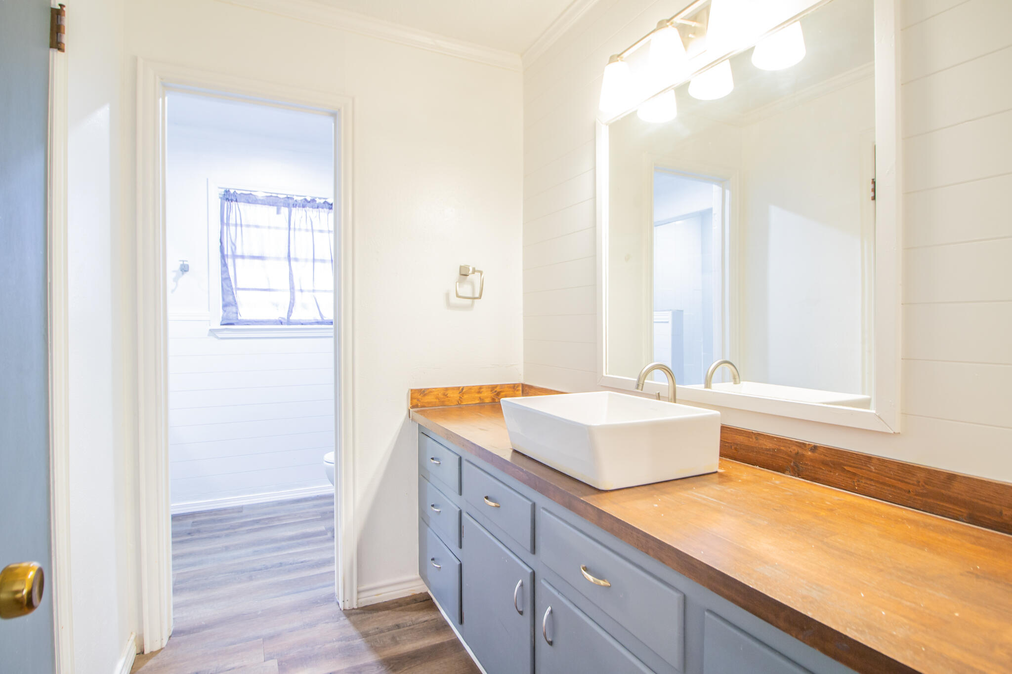 5503 9th Street Lubbock, TX 79416 - Photo 20 of 31 a bathroom with a sink and a bathtub
