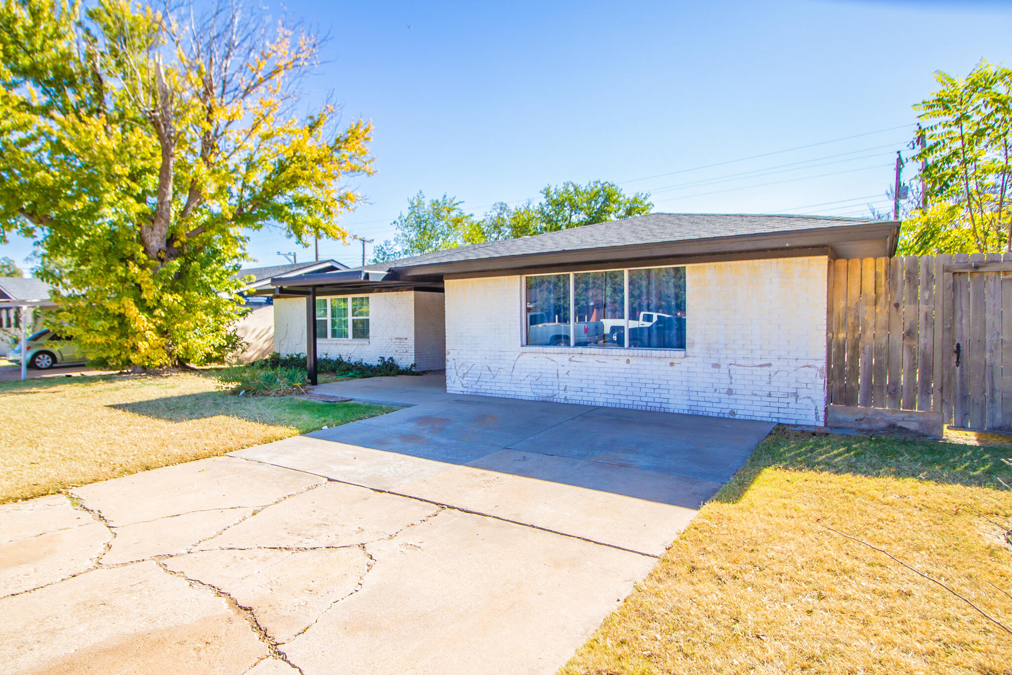 5503 9th Street Lubbock, TX 79416 - Photo 2 of 31 a house view with a garden space