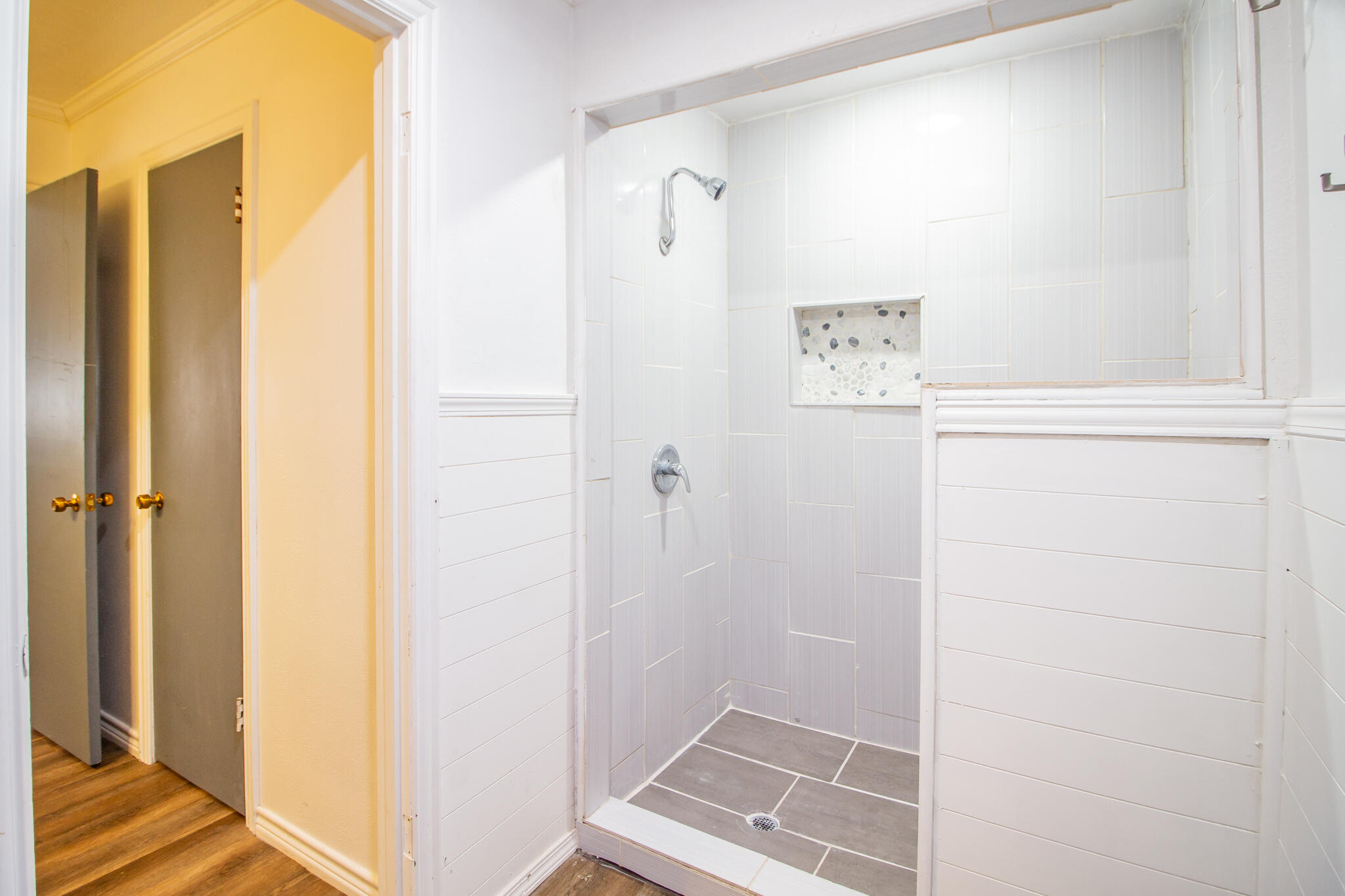 5503 9th Street Lubbock, TX 79416 - Photo 21 of 31 a bathroom with a shower