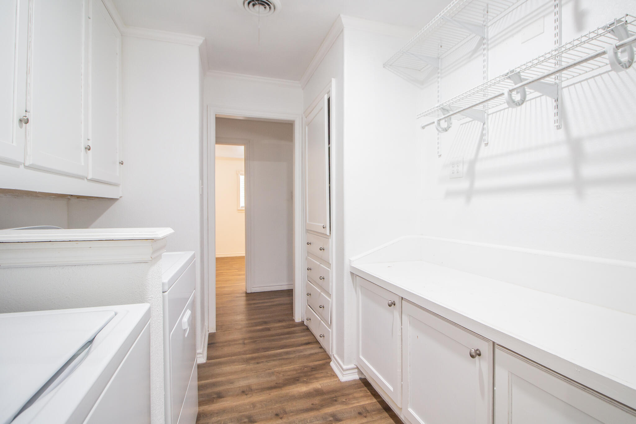 5503 9th Street Lubbock, TX 79416 - Photo 23 of 31 a bathroom with a sink and mirror