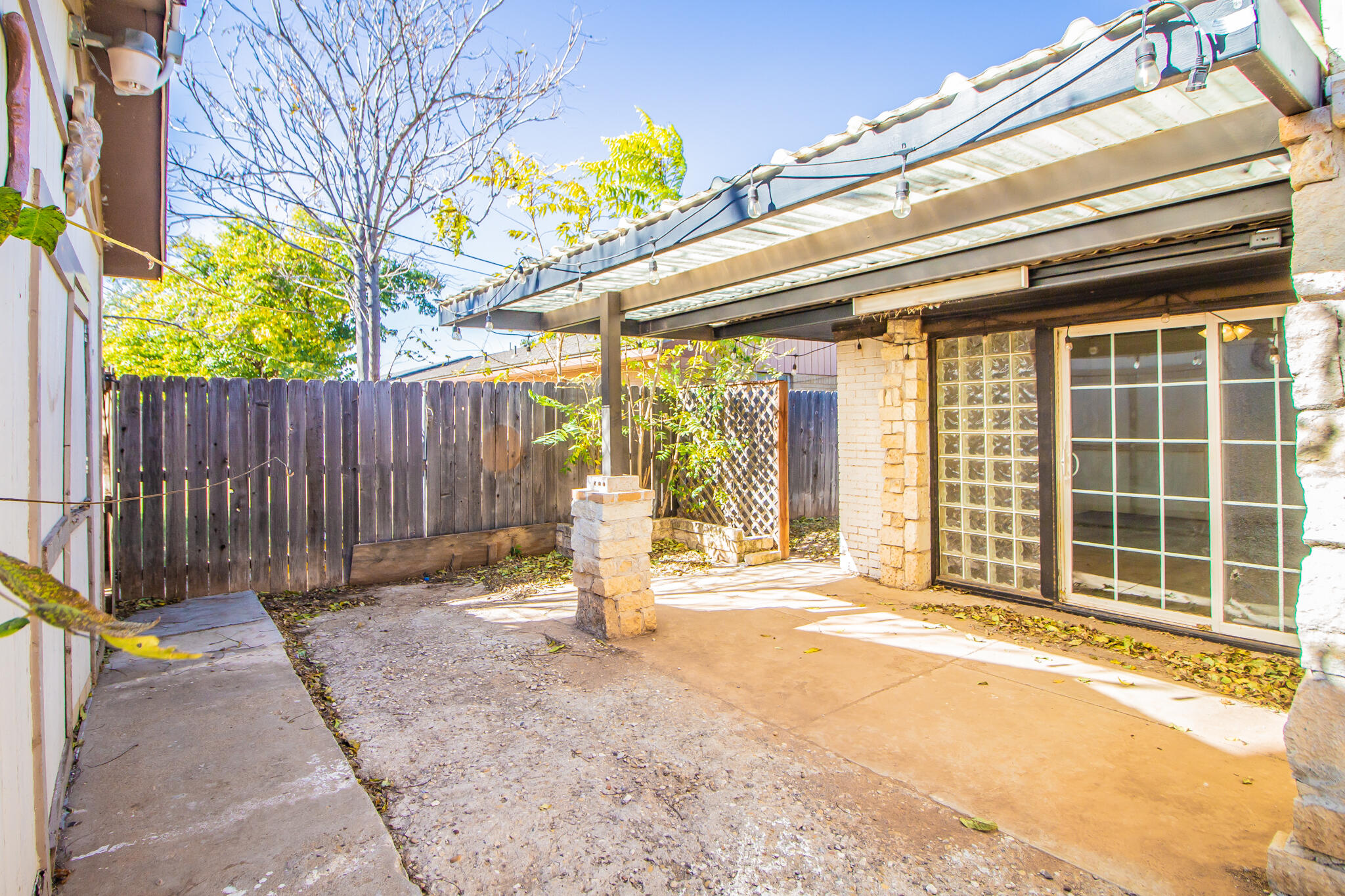 5503 9th Street Lubbock, TX 79416 - Photo 26 of 31 a front view of a building with a outdoor space