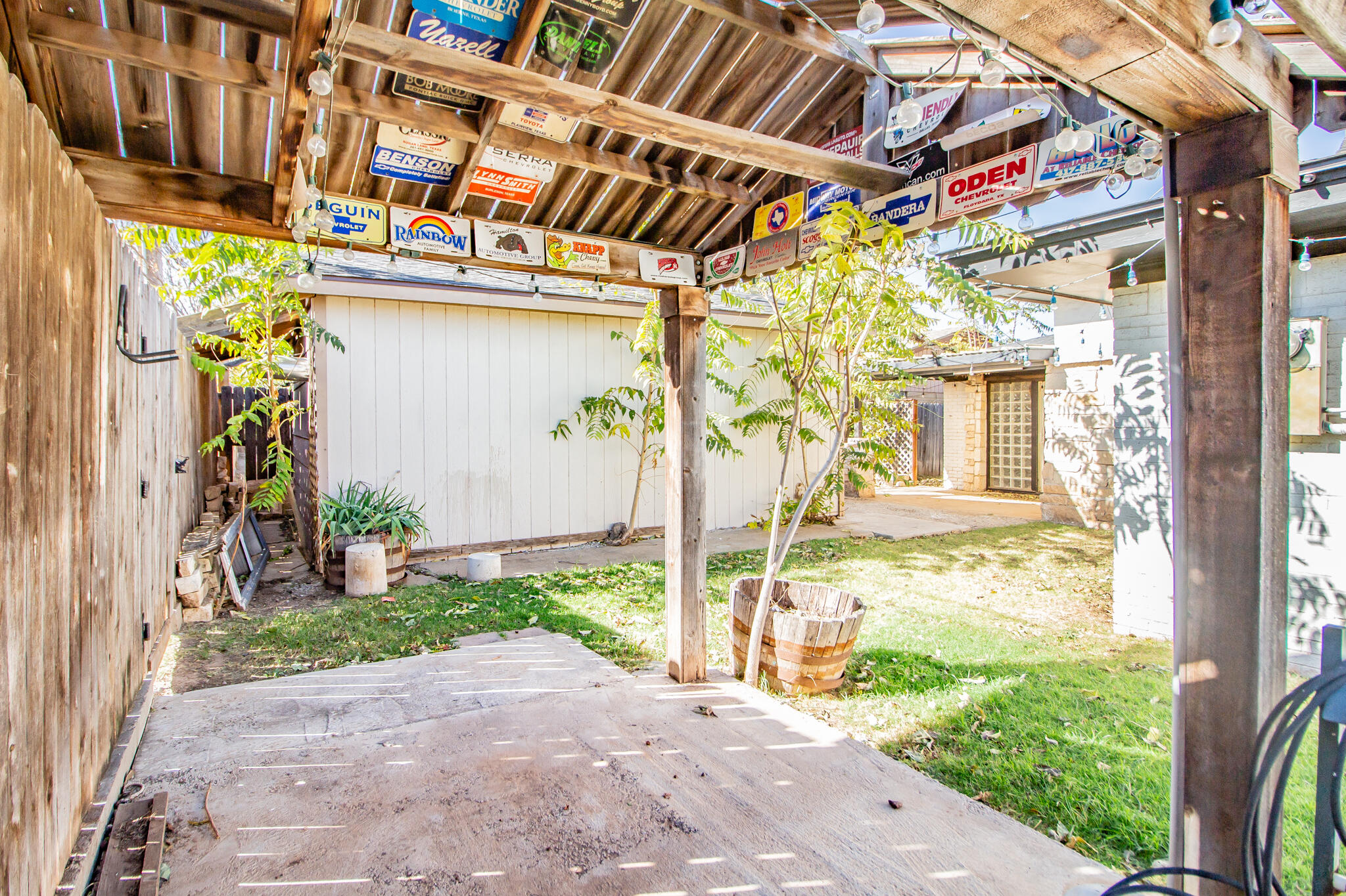 5503 9th Street Lubbock, TX 79416 - Photo 30 of 31 a front view of a building with a garden and plants