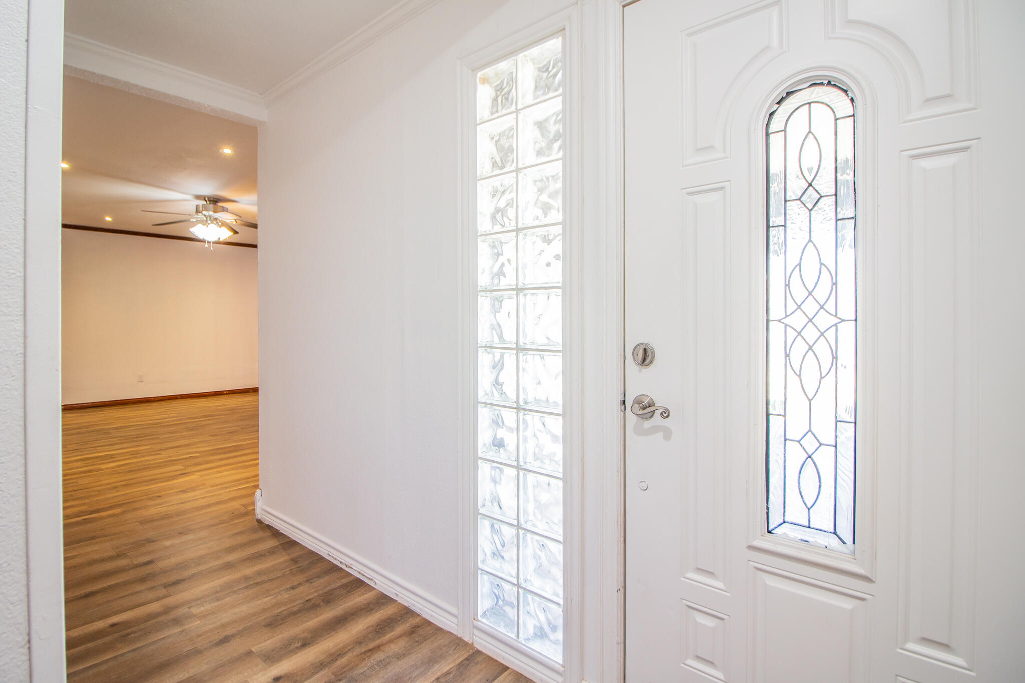 5503 9th Street Lubbock, TX 79416 - Photo 4 of 31 a view of front door with wooden floor