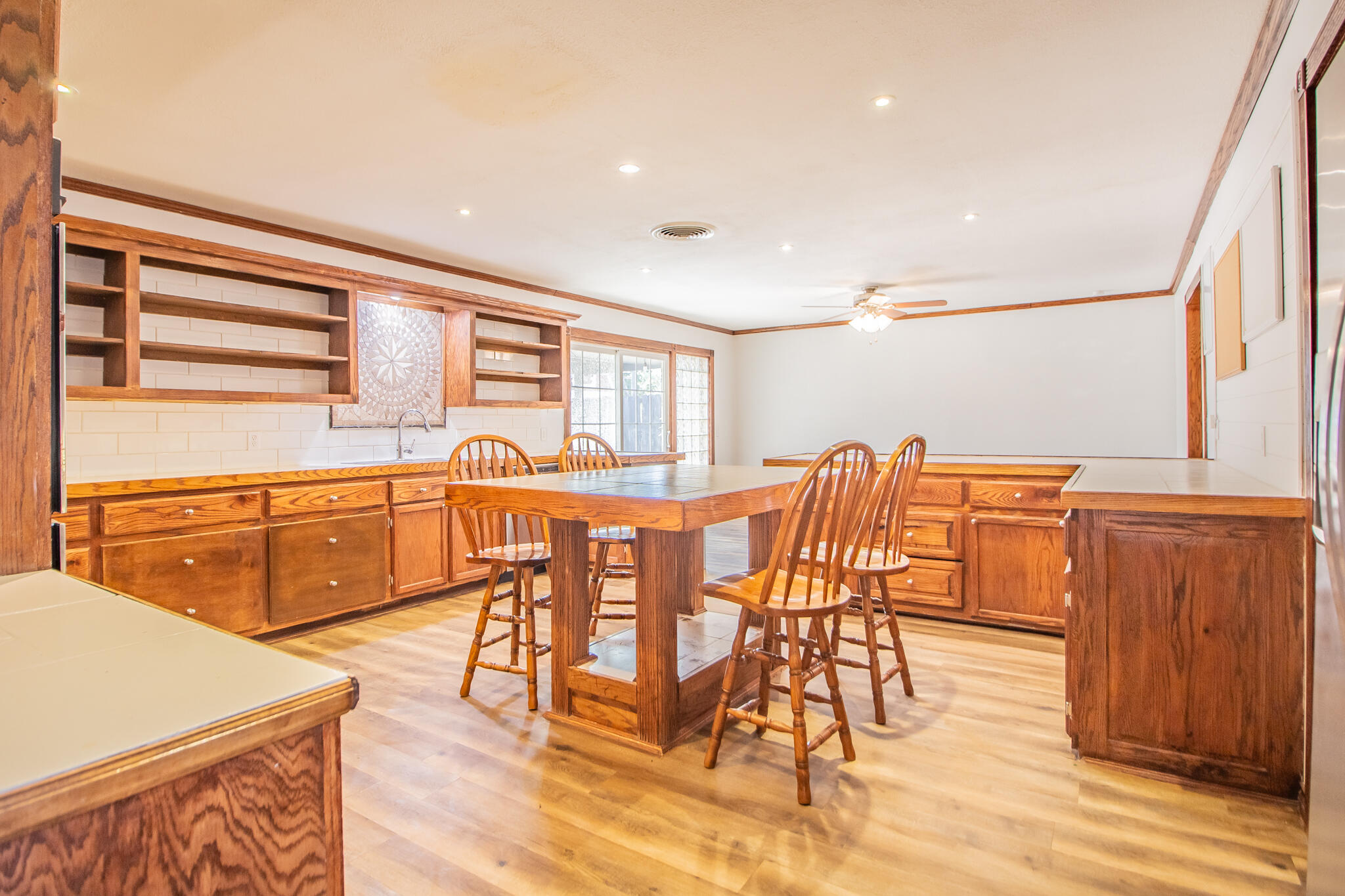 5503 9th Street Lubbock, TX 79416 - Photo 9 of 31 a dining room with furniture and wooden floor