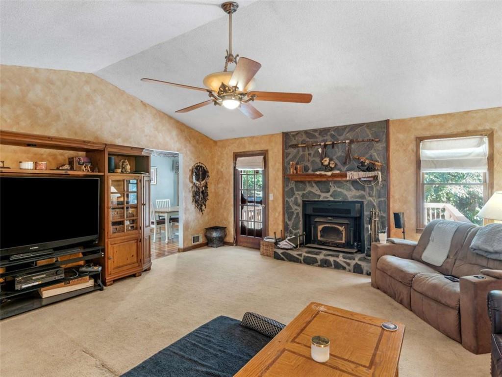 5 Ridgewood Circle McDonough, GA 30252 - Photo 5 of 20 a living room with furniture and a fireplace