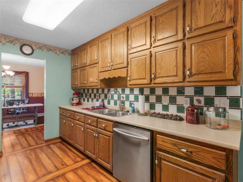 5 Ridgewood Circle McDonough, GA 30252 - Photo 8 of 20 a kitchen with stainless steel appliances granite countertop a sink and cabinets
