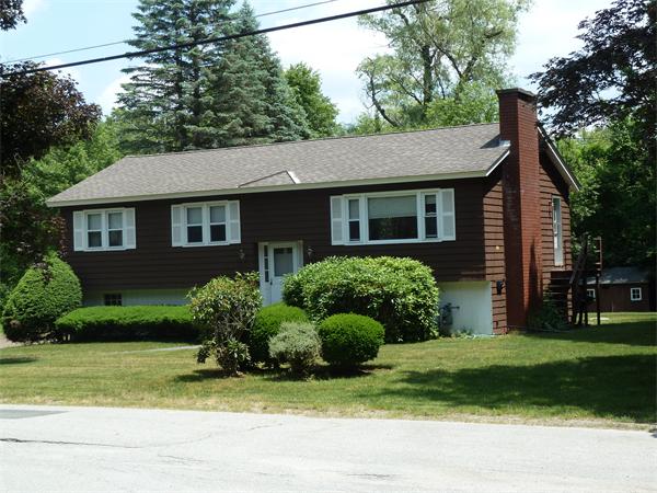20 Fenwick Road Chelmsford, MA 01824 - Photo 1 of 15 a front view of a house with a yard