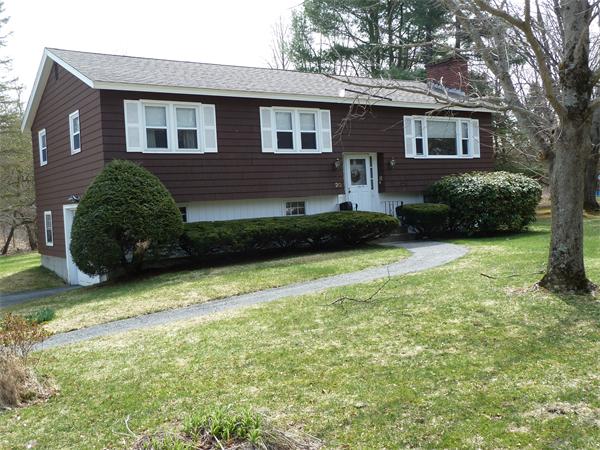20 Fenwick Road Chelmsford, MA 01824 - Photo 2 of 15 a front view of a house with garden