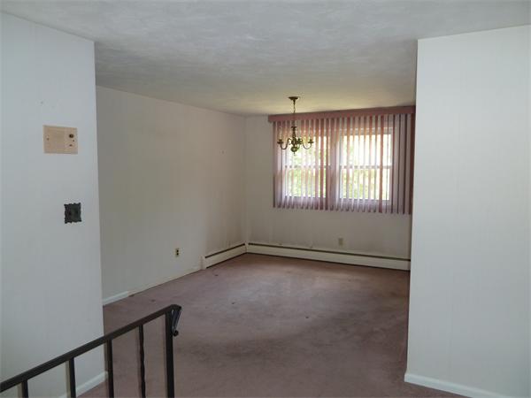 20 Fenwick Road Chelmsford, MA 01824 - Photo 4 of 15 a view of an empty room with a window