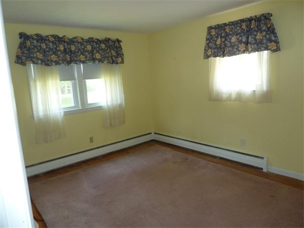20 Fenwick Road Chelmsford, MA 01824 - Photo 9 of 15 a view of a small space with wooden floor and a window