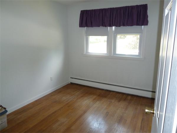 20 Fenwick Road Chelmsford, MA 01824 - Photo 10 of 15 a view of a small space with wooden floor and window