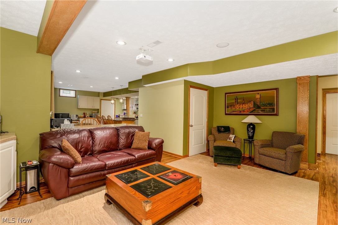 4490 Fenn Road Medina, OH 44256 - Photo 24 of 35 The lower level, walk-out offers a rec room with a theater. This room exits to a patio.