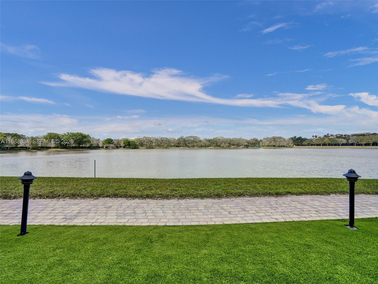 2681 North Flamingo Road, Unit 605S Sunrise, FL 33323 - Photo 25 of 47 a view of a lake with a big yard