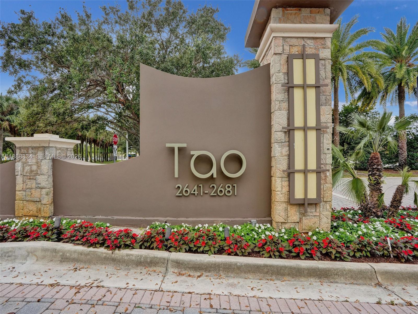 2681 North Flamingo Road, Unit 605S Sunrise, FL 33323 - Photo 33 of 47 a view of sign board with flower plants