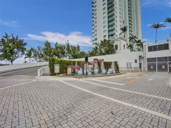 a view of a building with trees