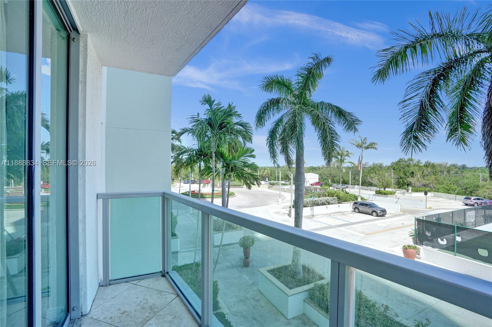 2681 North Flamingo Road, Unit 605S Sunrise, FL 33323 - Photo 42 of 47 a view of a balcony with palm tree