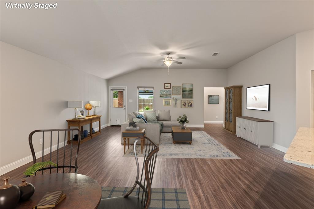 6909 Danridge Road Rowlett, TX 75089 - Photo 5 of 29 a living room with furniture