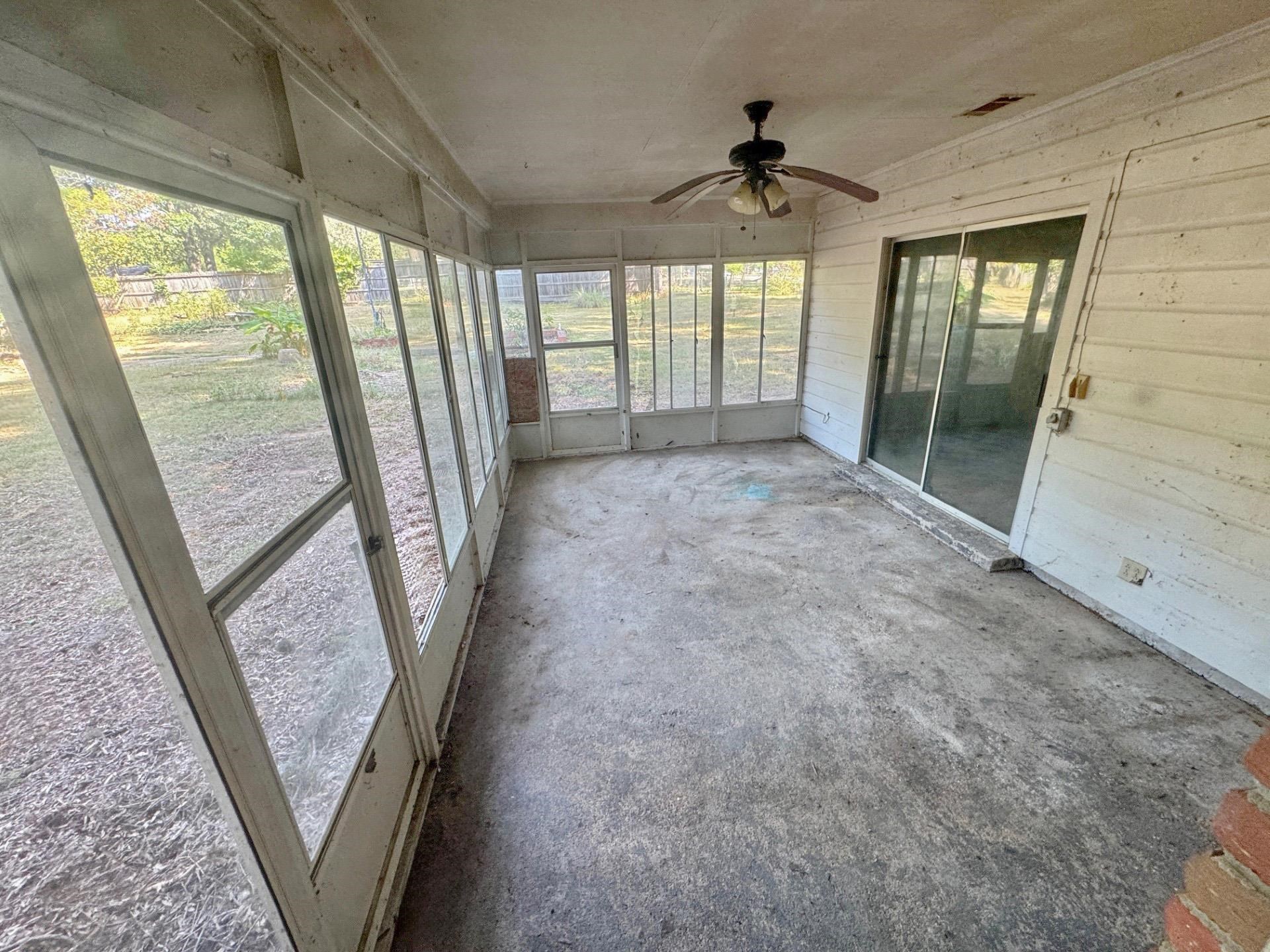 6014 Raleigh Lagrange Road Memphis, TN 38134 - Photo 19 of 19 Unfurnished sunroom featuring ceiling fan