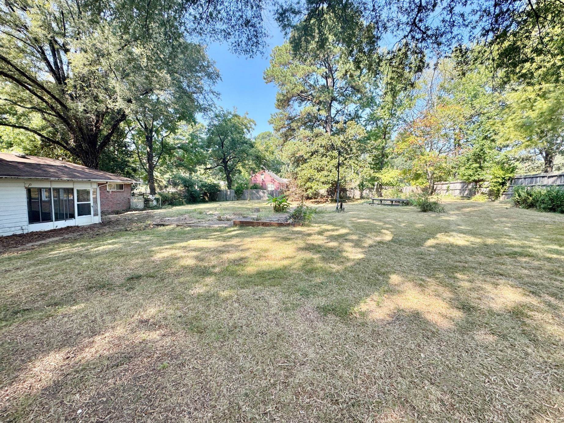 6014 Raleigh Lagrange Road Memphis, TN 38134 - Photo 5 of 19 View of yard featuring view of wooded area