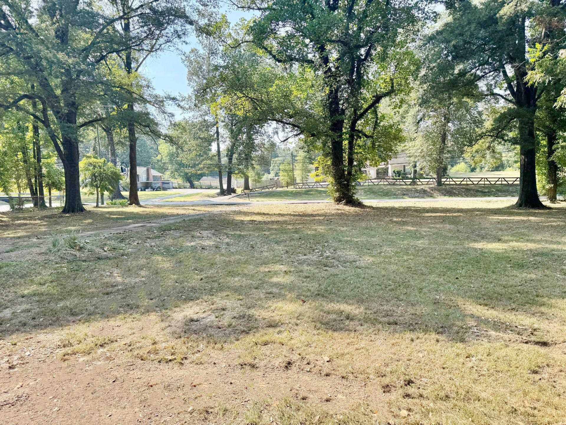 6014 Raleigh Lagrange Road Memphis, TN 38134 - Photo 6 of 19 View of yard with view of scattered trees