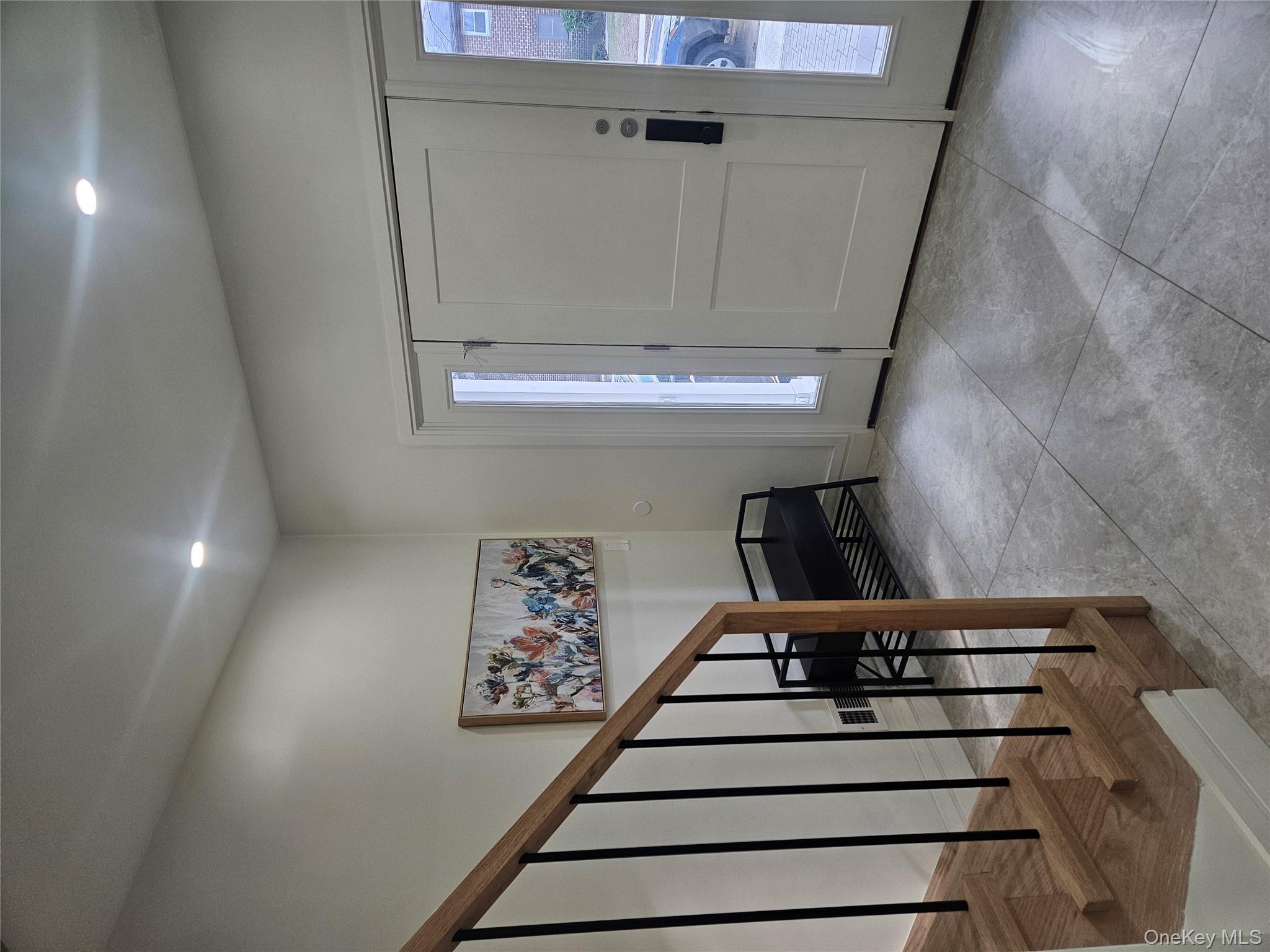 344 Bayview Avenue Inwood, NY 11096 - Photo 2 of 12 a view of entryway with stairs