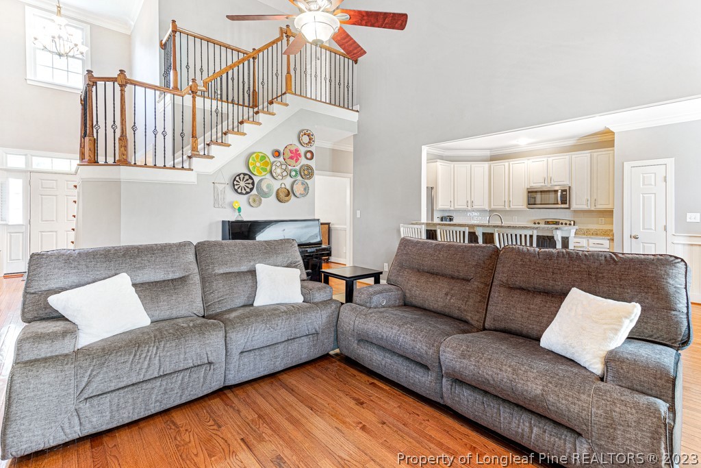645 Little Bridge Road Fayetteville, NC 28311 - Photo 13 of 49 a living room with furniture and a couch