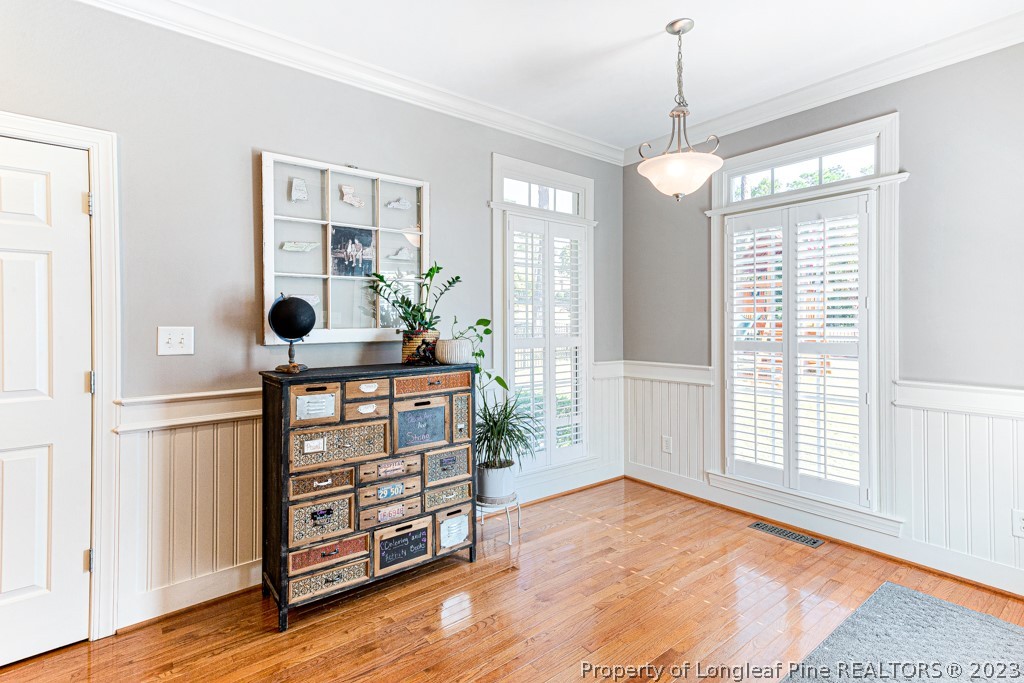 645 Little Bridge Road Fayetteville, NC 28311 - Photo 15 of 49 a view of a room with wooden floor and windows