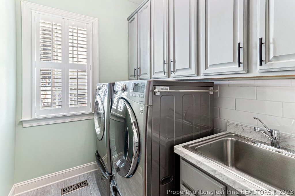 645 Little Bridge Road Fayetteville, NC 28311 - Photo 21 of 49 a utility room with dryer and washer