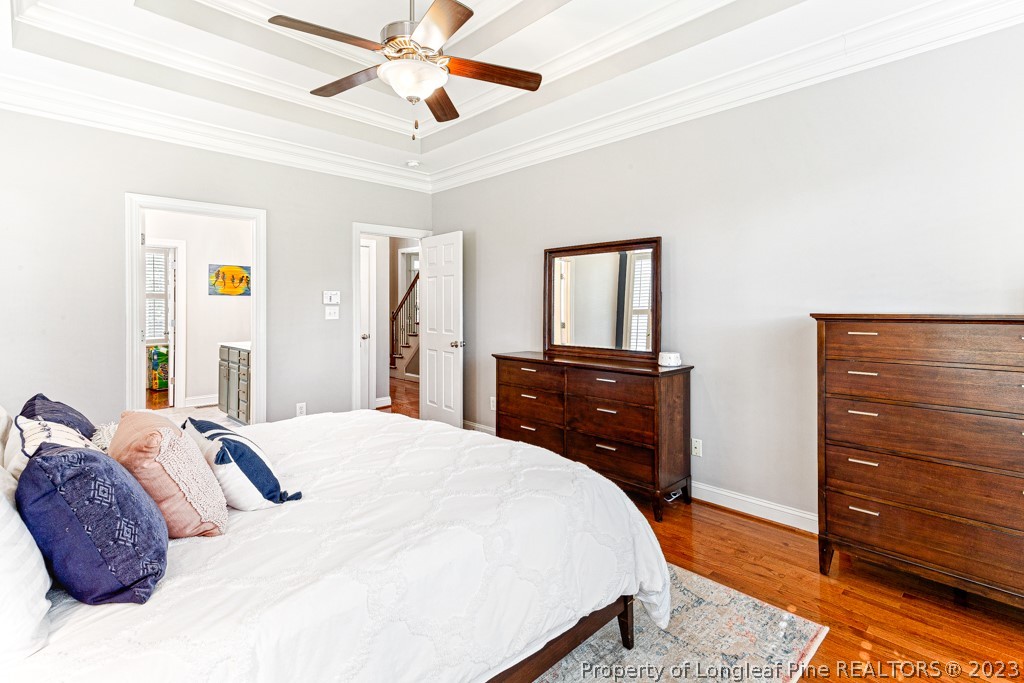 645 Little Bridge Road Fayetteville, NC 28311 - Photo 26 of 49 a bedroom with a bed and a dresser