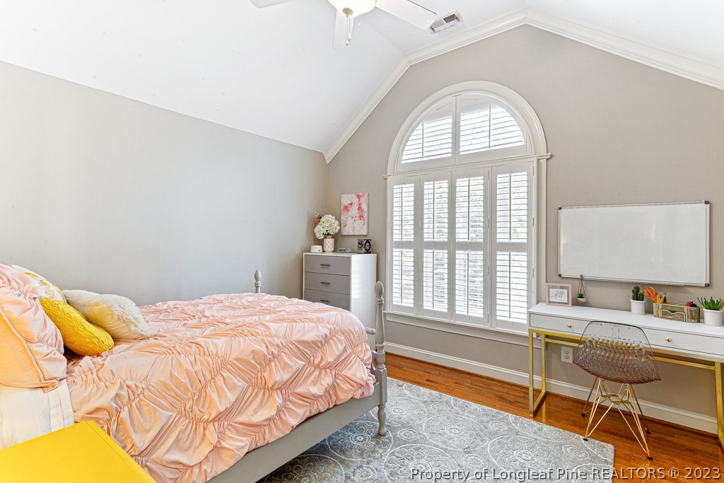 645 Little Bridge Road Fayetteville, NC 28311 - Photo 32 of 49 a bedroom with a bed and a window