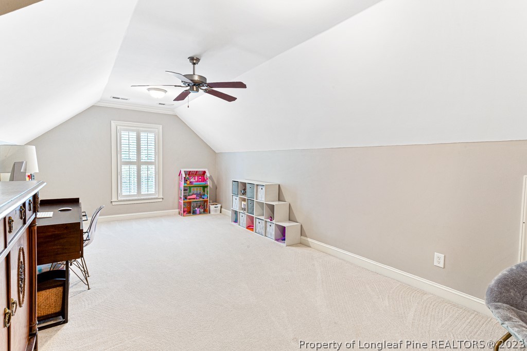 645 Little Bridge Road Fayetteville, NC 28311 - Photo 38 of 49 a living room with furniture and a ceiling fan