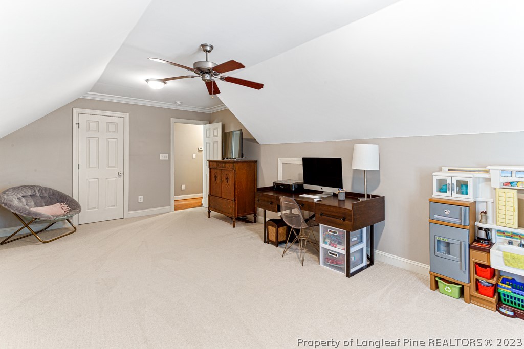 645 Little Bridge Road Fayetteville, NC 28311 - Photo 39 of 49 a living room with furniture and a flat screen tv