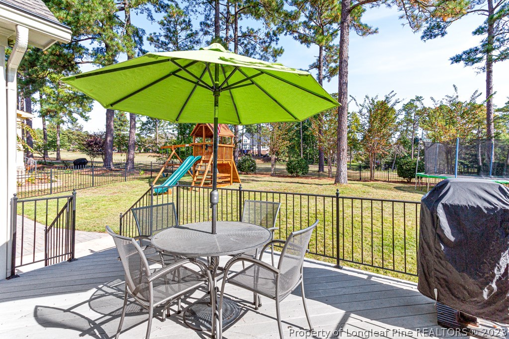 645 Little Bridge Road Fayetteville, NC 28311 - Photo 41 of 49 a view of a chair and table in the balcony