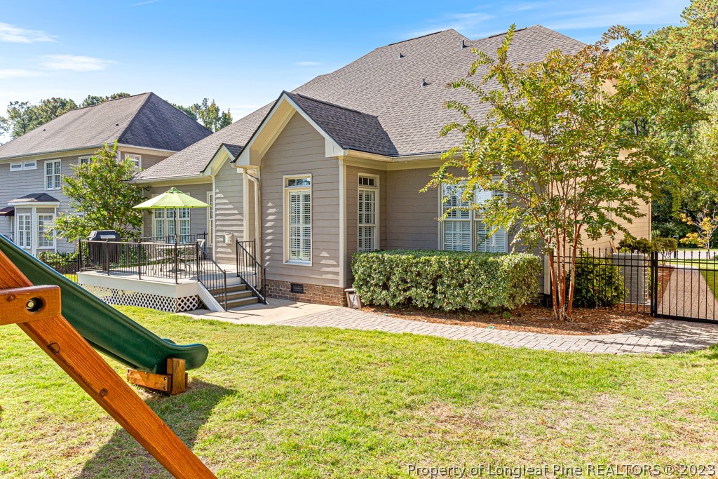 645 Little Bridge Road Fayetteville, NC 28311 - Photo 44 of 49 a view of a house with backyard and sitting area