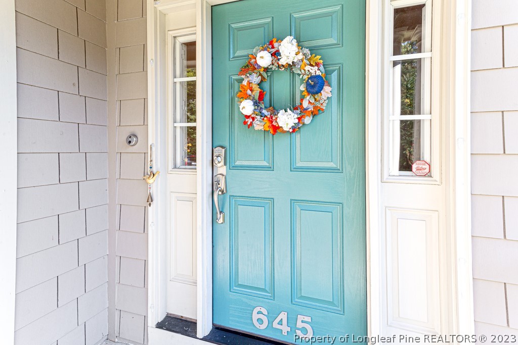 645 Little Bridge Road Fayetteville, NC 28311 - Photo 5 of 49 view of entryway with wooden floor