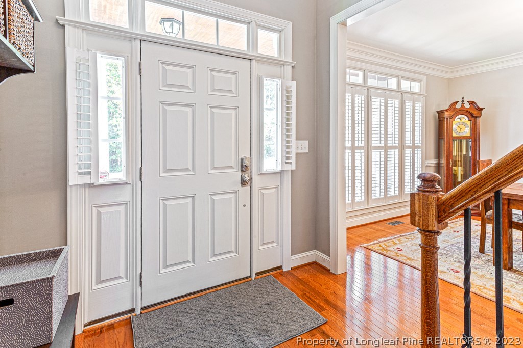 645 Little Bridge Road Fayetteville, NC 28311 - Photo 6 of 49 a view of an entryway with wooden floor