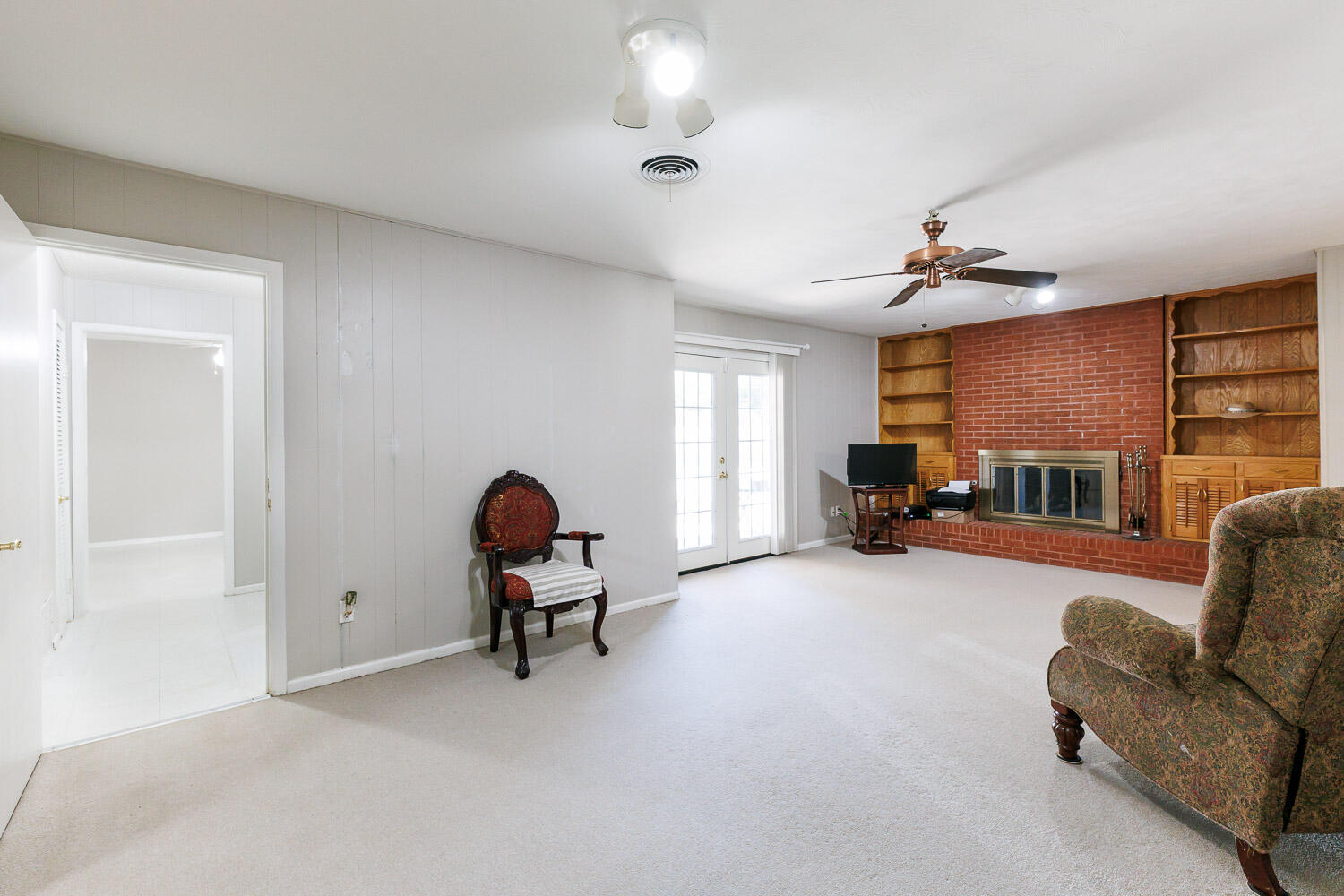3816 53rd Street Lubbock, TX 79413 - Photo 21 of 59 a living room with furniture and a window