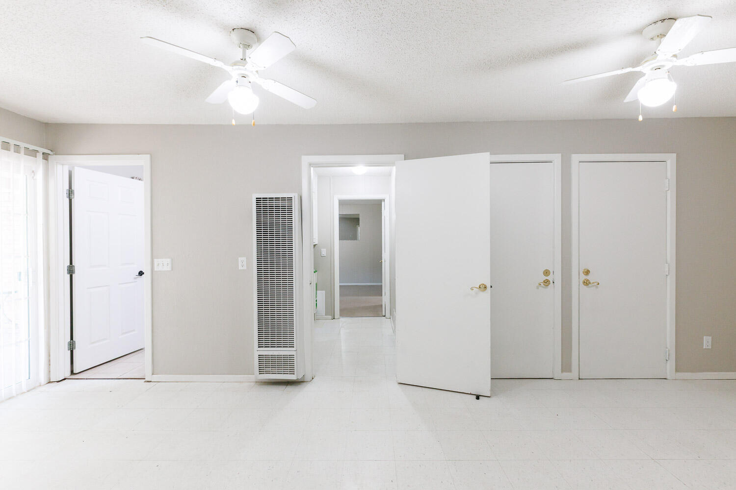 3816 53rd Street Lubbock, TX 79413 - Photo 25 of 59 a view of an empty room with a ceiling fan