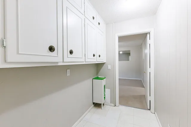 a front view of house with yard barbeque oven and outdoor seating