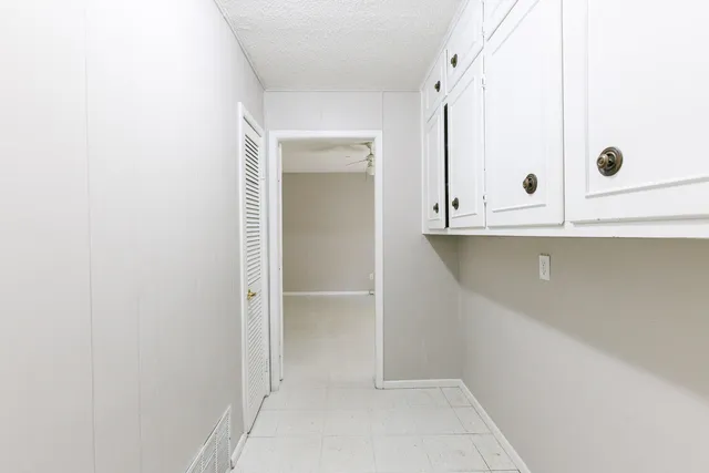 a front view of a house with a yard and a porch