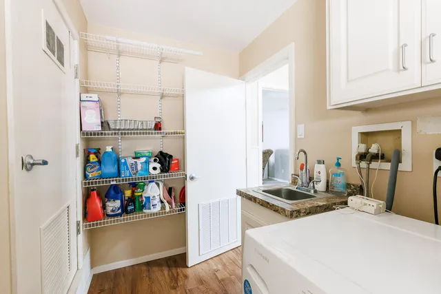 a view of a backyard of the house