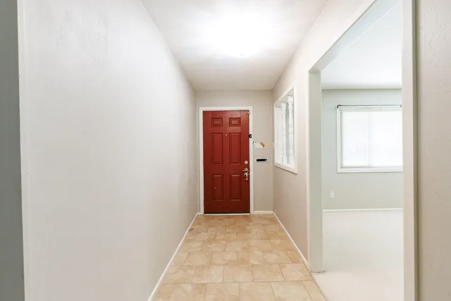 an empty room with windows