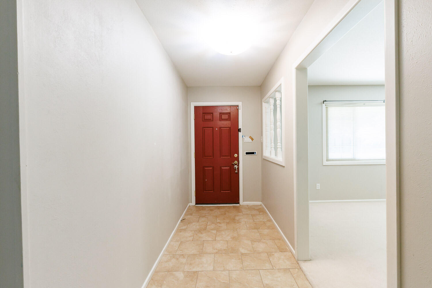 3816 53rd Street Lubbock, TX 79413 - Photo 5 of 59 a view of a hallway with wooden floor and closet