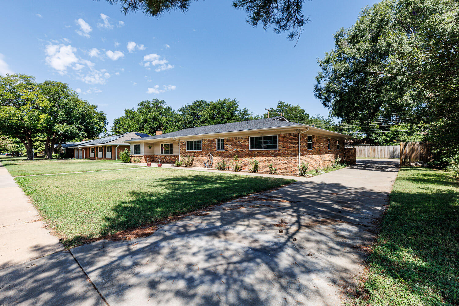 3816 53rd Street Lubbock, TX 79413 - Photo 59 of 59 a front view of a house with garden