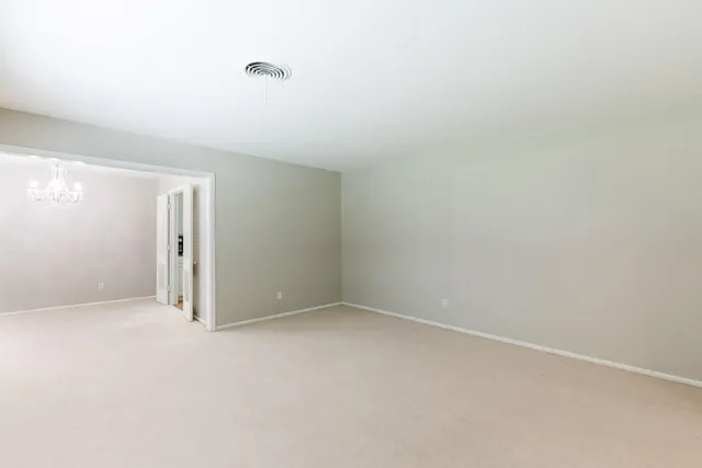 a kitchen with a sink stove and refrigerator