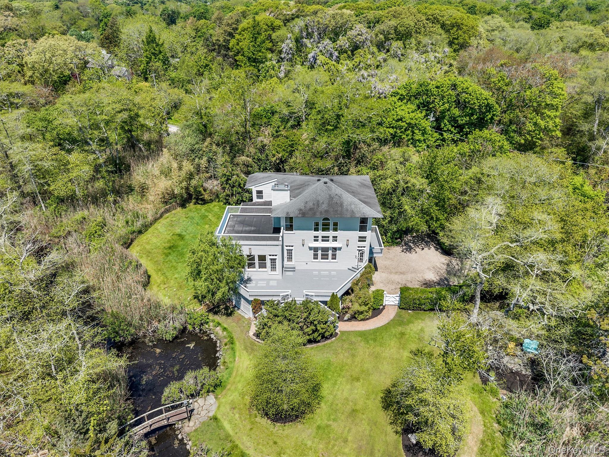 238 Beaver Dam Road Brookhaven, NY 11719 - Photo 3 of 44 a aerial view of a house with a yard